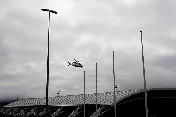 A helicopter coming in for landing at Vágar Airport.