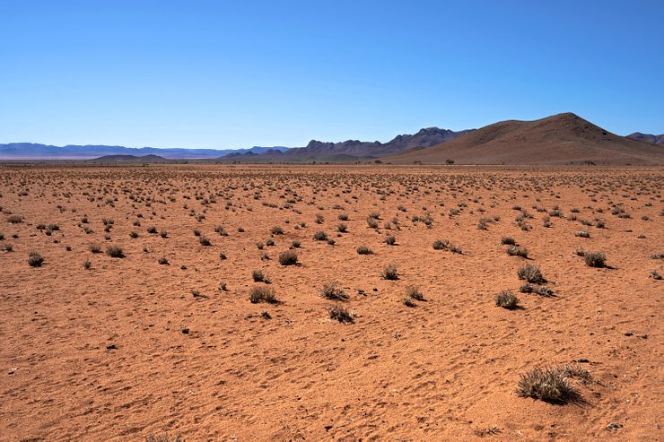 Near the end of the road to the north.